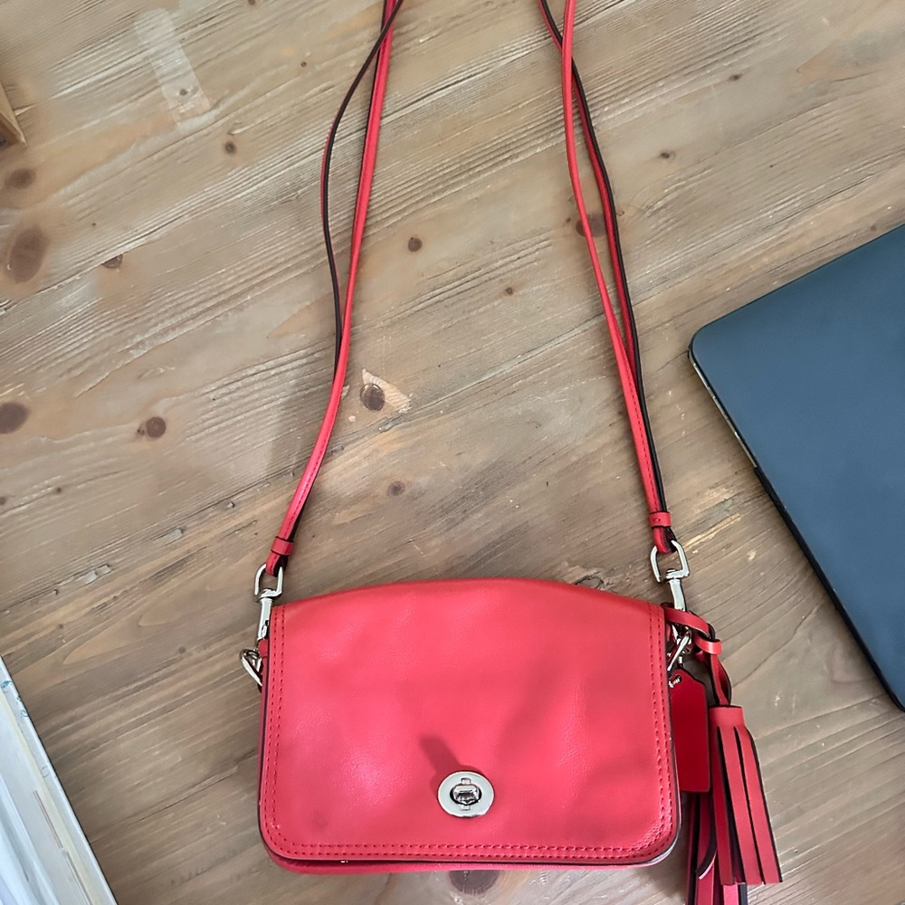 Red Coach Crossbody bad measures 9.5 x 5.75 x 2